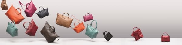 Longchamp 經典摺包換上真皮